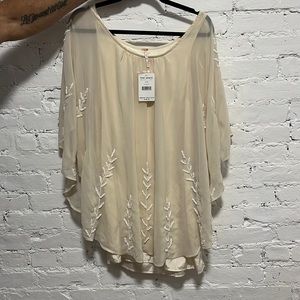 Free People satin dress with sheer beaded overlay. New with tags.